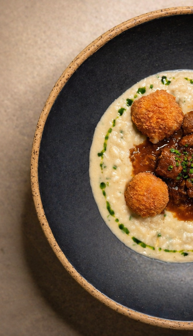 Risotto with braised meat and golden croquettes